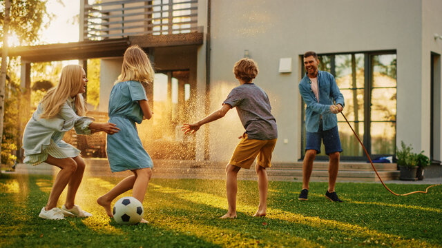 Family playing in grass